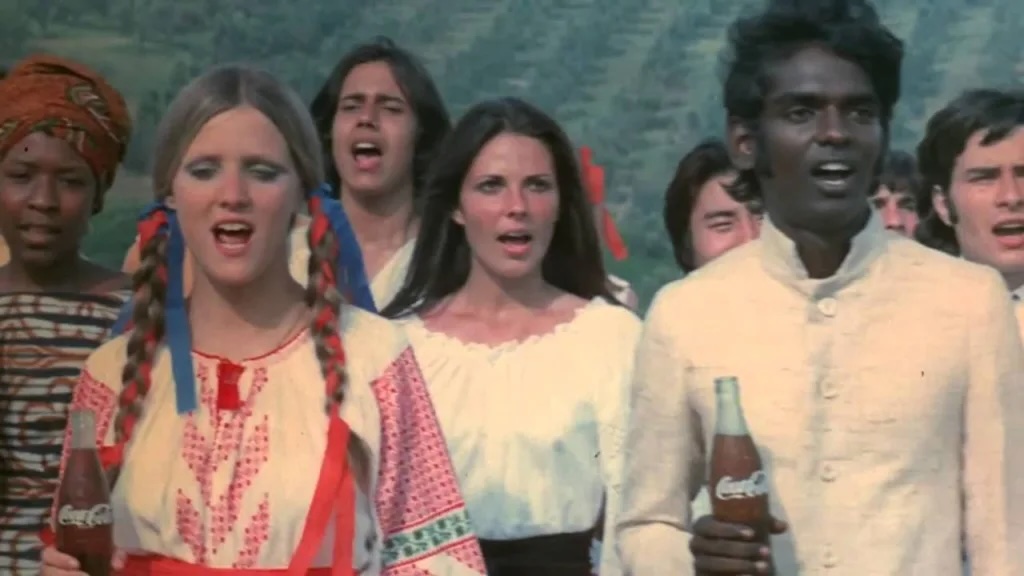 The 1971 Coca-Cola "Hilltop" commercial, famous for the jingle "I'd Like to Teach the World to Sing (In Perfect Harmony)," featured a diverse group of young people on an Italian hillside singing about unity and peace. 